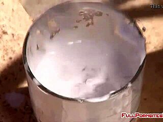 Watch this shaved pussy slave sucking on big black cocks in interracial bdsm action!