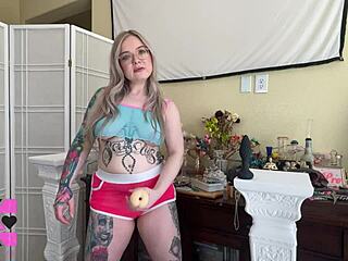 Horny tattooed blonde goddess with blue eyes gives dirty talk femdom joi for gooner plug and pump session