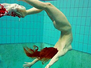 Hot underwater teen Marketa swims in bikini at the pool with petite European body