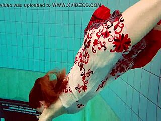 Hot underwater teen Marketa swims in bikini at the pool with petite European body