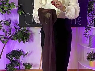 Sexy mature blonde slips into coffee colored tights for a teasing nylon display