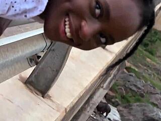 Oh yeah, take this big white cock deep in your throat. Sexy black babe gives sloppy face fucking on the road to her dominating friend