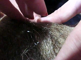 In a close-up view, he licks and sucks her big hairy clit until the girlfriend squirts with a huge orgasm.