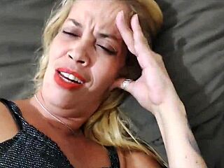 She decided to get a new tattoo while keeping a special accessory in place for added thrill during the session