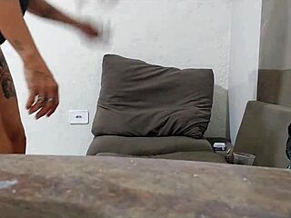 She decided to get a new tattoo while keeping a special accessory in place for added thrill during the session