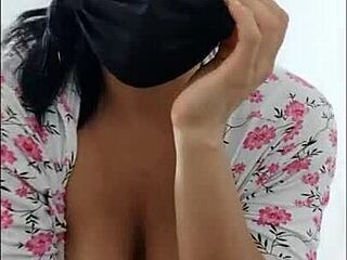 this milf with a beautiful big ass dances casually showing it off along with her huge nipples in lingerie