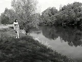 Sweet beautiful cute sexy girl Assol teases in erotic music video clip. She flashes panties and shaved pussy outdoors in skirt and lingerie solo.