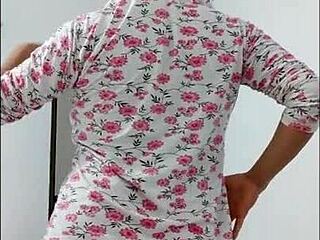 this milf with a beautiful big ass dances casually showing it off along with her huge nipples in lingerie