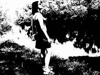 Sweet beautiful cute sexy girl Assol teases in erotic music video clip. She flashes panties and shaved pussy outdoors in skirt and lingerie solo.