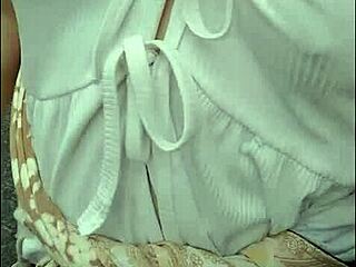 viral teacher naglakad ng walang bra sa public road at nilaro ang susu in a fun outdoor moment.