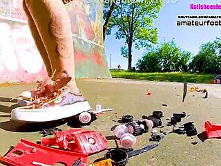 Kati crushes toy cars with her sneakers in this giantess trample video stomping plastic cars underfoot