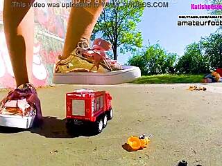 Kati crushes toy cars with her sneakers in this giantess trample video stomping plastic cars underfoot