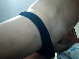 Pillow humping leads to a surprising cum moment in this simple bedroom setup