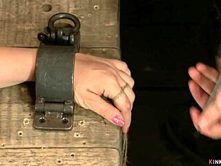 What happens when lezdom uses toys on a redhead in device bondage?