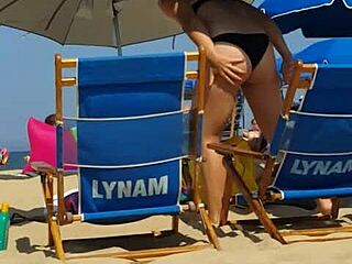 Candid Bikini Slut Exposed on Beach with Tight Ass in Hidden Shot