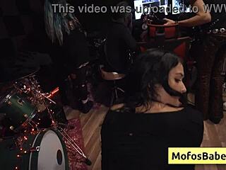 check out this busty brunette nia bleu gettin slammed while band jams nearby
