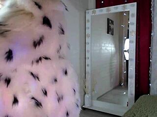 Mature bitch in beautiful fur coat masturbates with dildo showing shaved pussy and big natural tits
