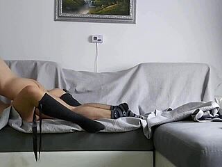 Young couple shares passionate intense sex on the sofa