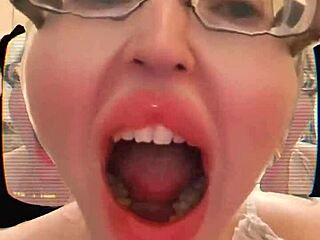 tongue out yawnin huge saliva fetish glasses drool