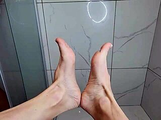 mmm footjob on my cock in the morning shower feels so damn good milf