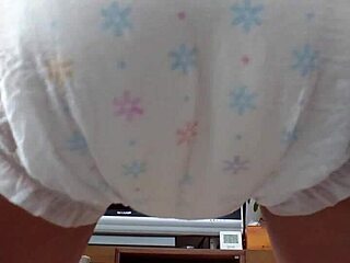 Japanese cutie messes her diaper wild