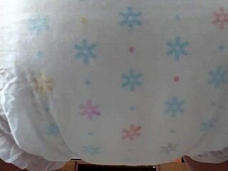 Japanese cutie messes her diaper wild