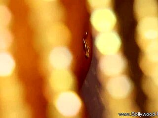 bollywood babe strips and flashes her curves teasing