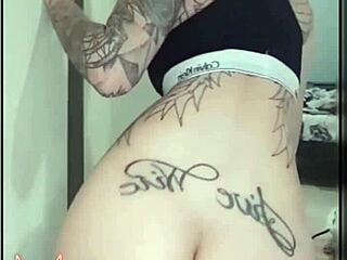 naughty brazilian rachell miranda bounces her big tattooed tits on huge solo dildo