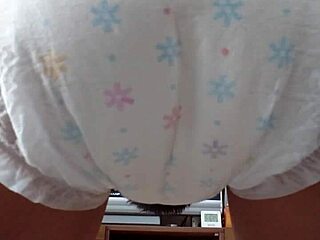 Japanese cutie messes her diaper wild