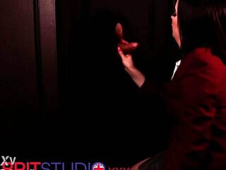 in the dim gloryhole booth a blue-eyed student in lingerie deepthroats cock swallows cum and gets facial from neighbor