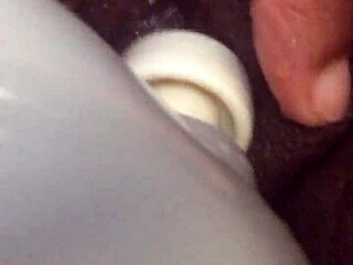 ebony babe squirts wildly all over the living room sofa?