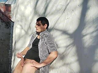 sexy bodybuilder strokes massive cock outdoors in hot jerkoff