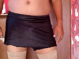 girl dances sexy in shiny pink thong and nylons