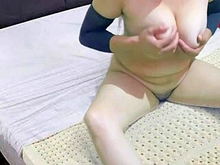 desi bhabhi bares her big natural tits nude on bed