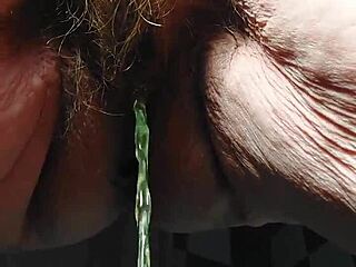 hey oma stuffs that cucumber deep in her hairy granny pussy