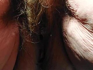 hey oma stuffs that cucumber deep in her hairy granny pussy