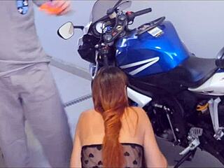 Redhead slut rims biker mechanic's ass at work
