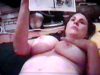 Busty Israeli wife Irit Lev flashes her big tits amateur style