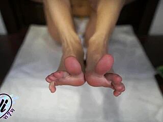 brunette teen oils tattooed feet for close-up fetish tease