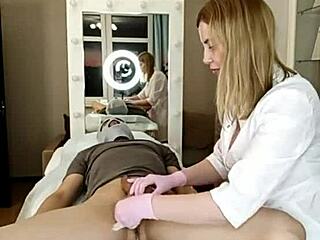 a beautiful babe trims her man's huge cock pubis and asshole smooth while he's bent over on all fours