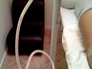 Chubby slave endures enema and anal fisting in hospital