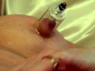 big tits mature uses sucking cups on nipples