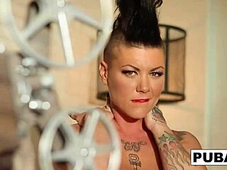 Jezebelle Bond spreads wide fingering her milf pussy nude on sofa