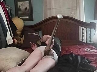 She crams dildo deep in ass