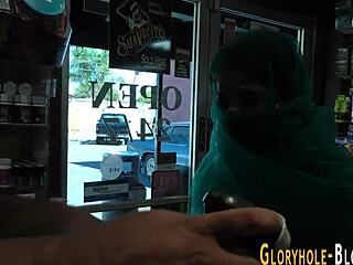 Arab babe sucks massive black cock at gloryhole for facial cumshot