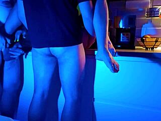 Wife Guzzles Two Cocks in Neon Threesome Frenzy