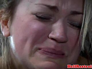 Black Master Canes Restrained Tan-Lined BDSM Sub Close-Up