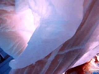 marketa's white dress clings wet in pool tease