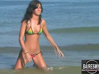 Jessica's bikini dance heats up the beach sensually