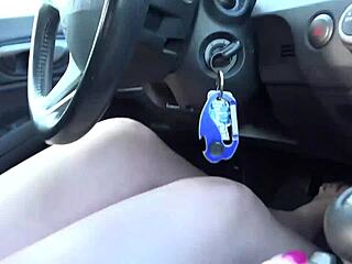 brunette drives manual stick shift completely barefoot outdoors